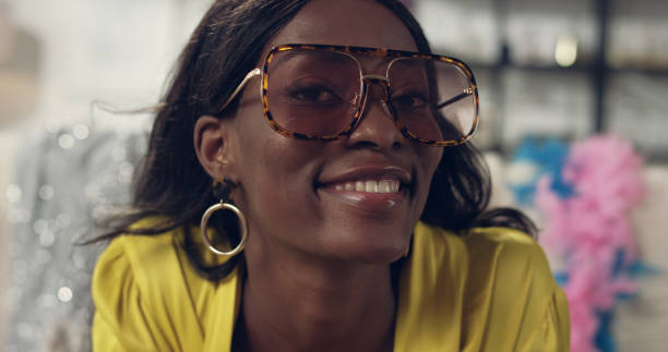 istock African ethniicity woman making faces to a camera. Funny eyewear 1177315364