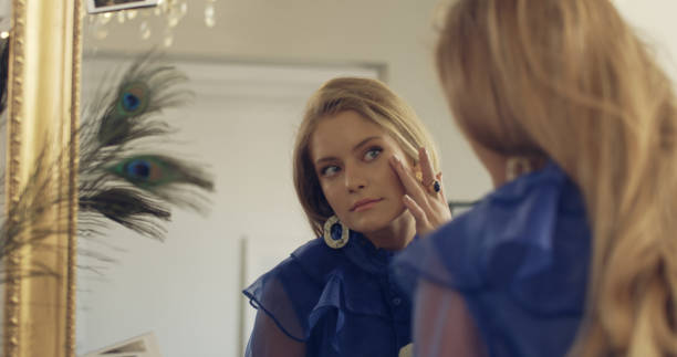 istock Elegant young woman preparing for a party 1177315464
