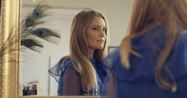 istock Elegant young woman preparing for a party 1177315993
