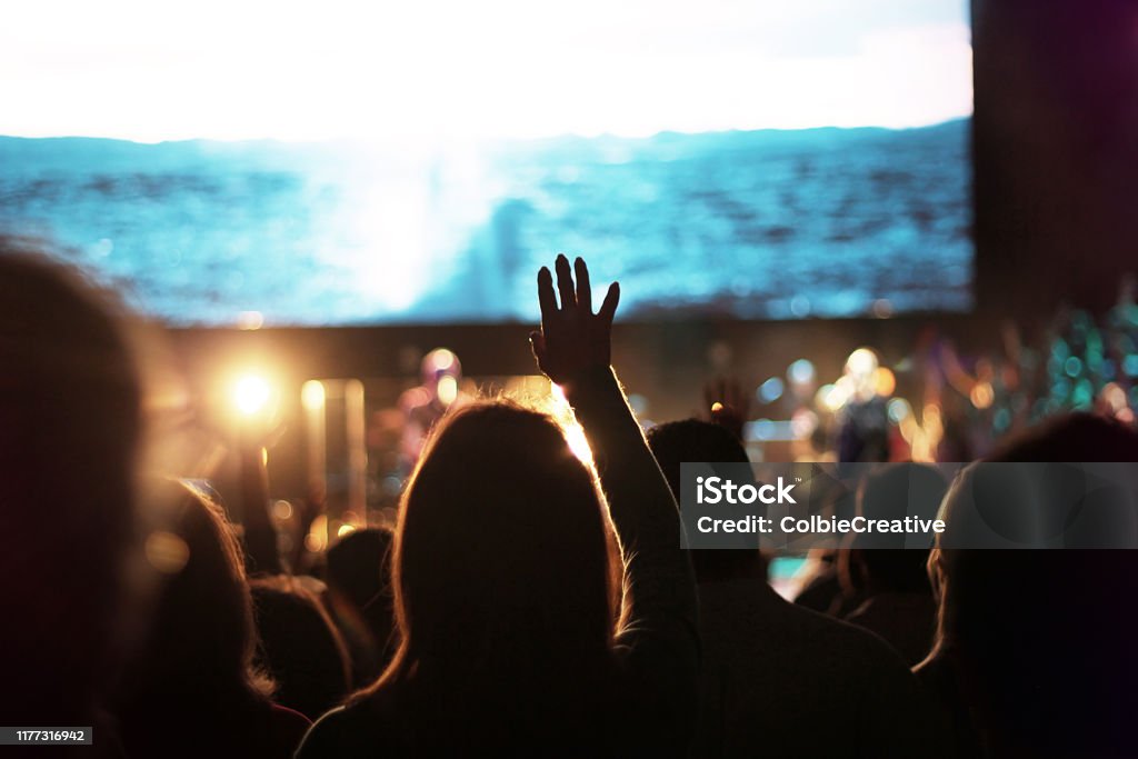 Church Worship Crowd crowd worship worshipping worshipper church Sunday hand hand up hands up sing singing choir easter concert production band music song songs sing singing Church Stock Photo