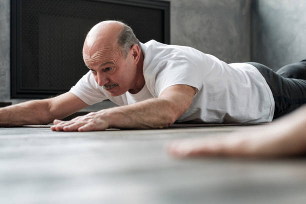 istock man in Cobra or sphinx pose bhujangasana variation in the gym 1177319151