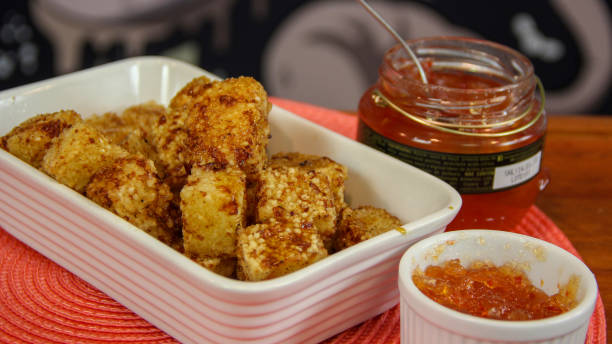 istock Brazilian snack tapioca cheese cubes served with pepper jelly (dadinho de tapioca) 1177328365