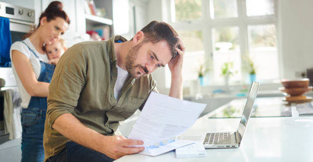 money worries home finances not tallying up for young family desperate mom stock pictures, royalty-free photos & images
