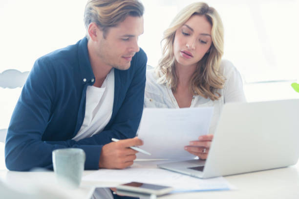 istock Young Couple working on their home finances and other paperwork. 1177331773