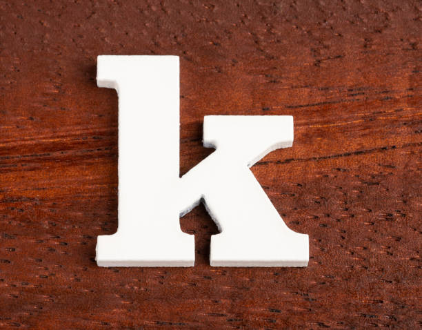 istock k - lowercase letter. Piece in wood 1177332797