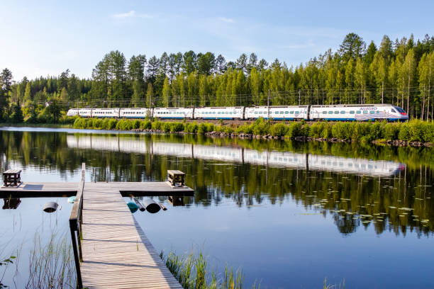 allegro high speed train reflected in finland lake - allegro imagens e fotografias de stock