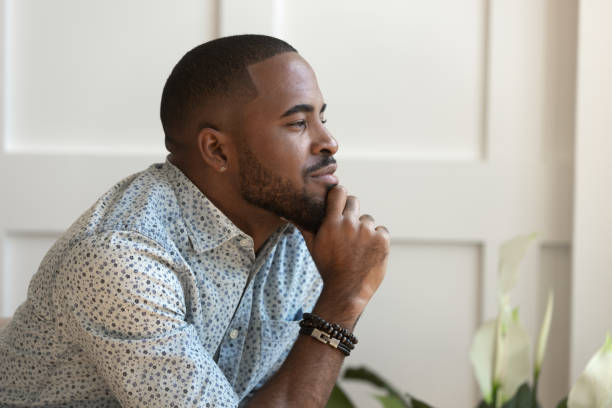 istock Close up happy calm young african american thoughtful guy. 1177334826