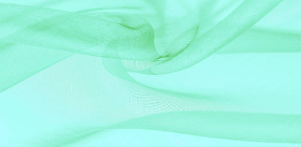 istock Texture of green silk fabric. It is also perfect for your design, clothes, posters. Be creative with beautiful project accents. This fabric is inspired by your inspiration. 1177335194