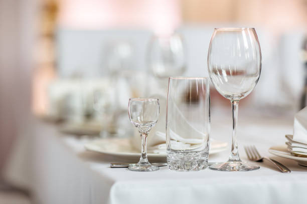 istock Close up picture of empty glasses in restaurant. Selective focus. empty glasses on the table 1177337350
