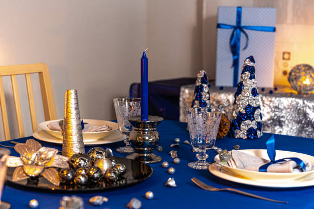 istock Christmas table decoration with wrapped gifts in background 1177341563