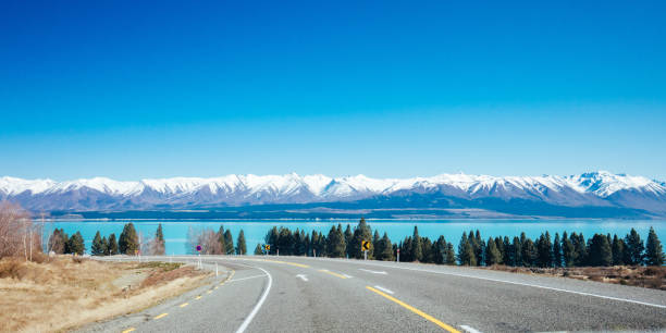 Roads and driving around Lake Pukaki on a clear sunny spring day in New Zealand
