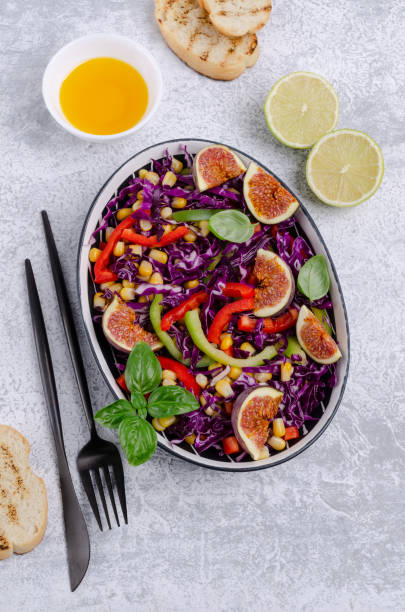 istock Salad of raw vegetables with figs 1177356483
