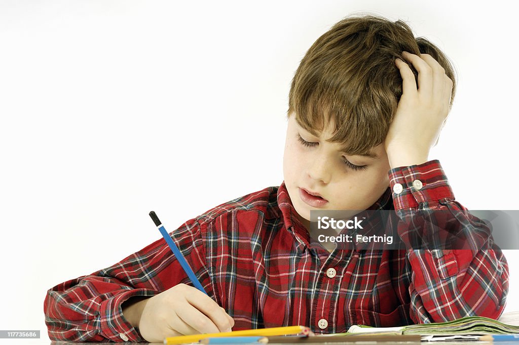 Niño estudiando - Foto de stock de 10-11 años libre de derechos