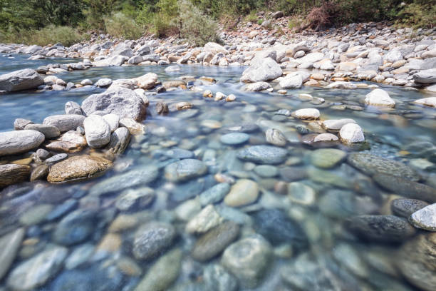 river melezza and maggia flowing through pebble riverbed in switzerland - melezza imagens e fotografias de stock