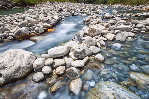 river melezza and maggia flowing through pebble riverbed in switzerland - melezza imagens e fotografias de stock