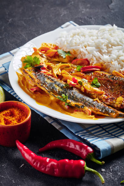 istock fish yellow curry, Panang curry with Grilled Saba mackerel fish 1177366632