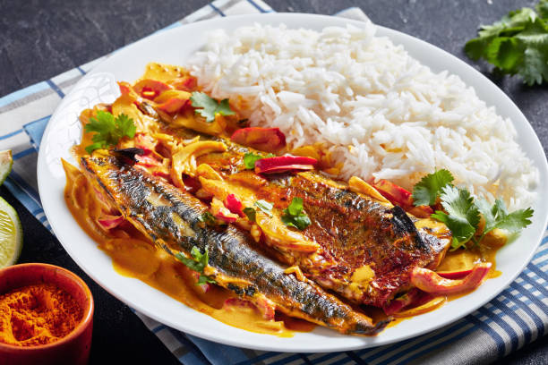 istock fish yellow curry, Panang curry with Grilled Saba mackerel fish 1177366652