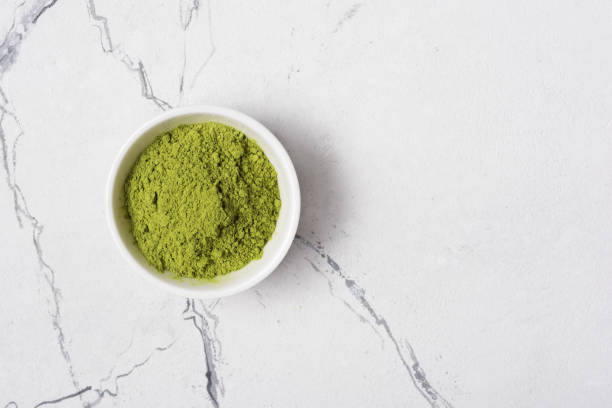 istock Green matcha tea powder in bowl 1177366702