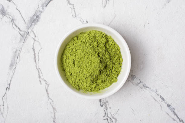istock Green matcha tea powder in bowl 1177366729