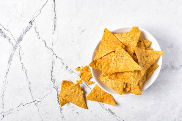 istock Top view of mexican nachos spicy chips in plate 1177366730