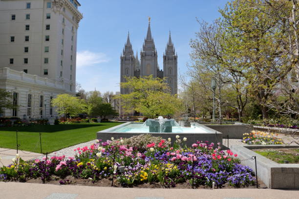 Salt Lake Temple in Spring A view of the Salt Lake Temple at Temple Square in Spring with trees and flowers in bloom, Salt Lake City, Utah salt lake city mormon temple utah photos stock pictures, royalty-free photos & images
