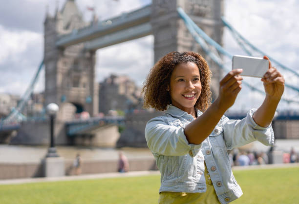 istock Happy tourist taking a selfie in London 1177370484