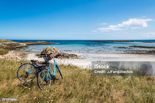 Bicycle Parked Against The Sea In The Island Of Batz Stock Photo - Download Image Now