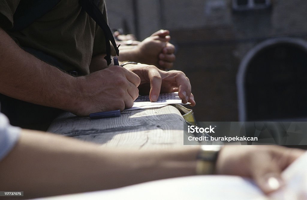 Ligne de personnes mains écrire des notes, Venise, Italie - Photo de Adulte libre de droits