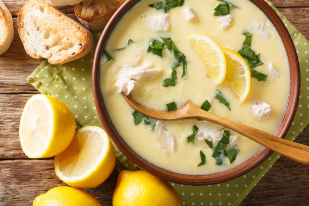 istock Fresh greek lemon soup with chicken and orzo paste close-up in a bowl. Horizontal top view 1177380725