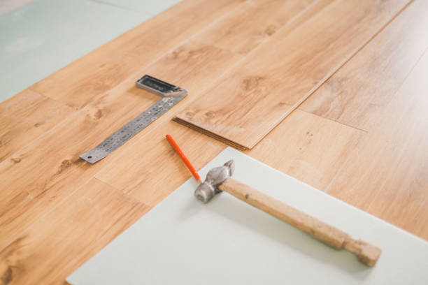 istock Tools on the floor in process of laying laminate 1177381079