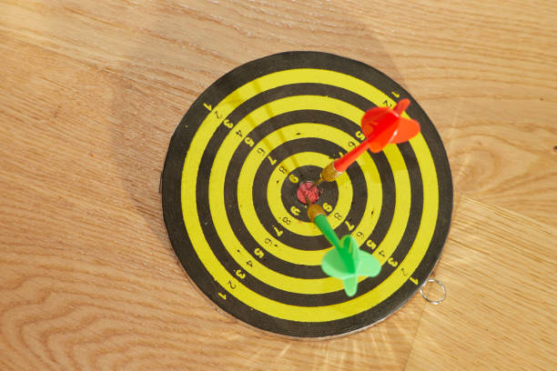 istock two dart arrows exactly in the middle of a target disk 1177382284