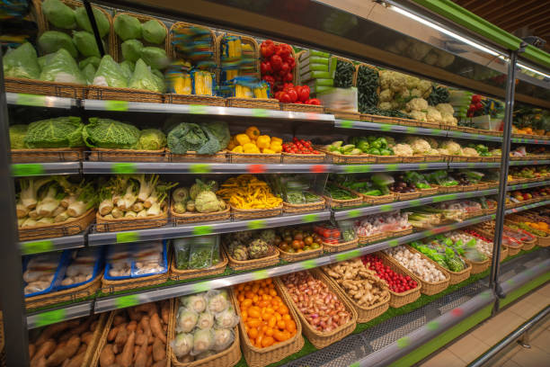 istock vegetable counter in a supermarket. 1177383978