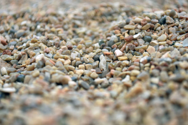 istock Sea pebble. Colorful small pebble and stone texture. Detailed sand texture. 1177385747