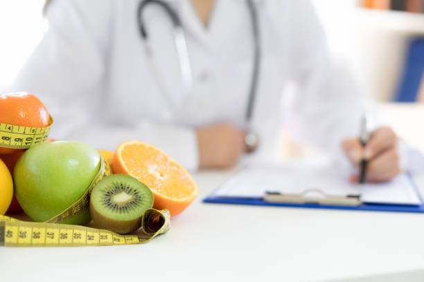 istock Doctor writes the prescription for diet 1177386700