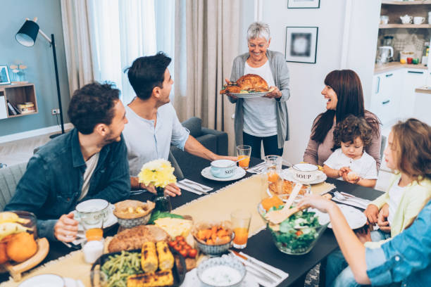 istock Senior woman serving roasted turkey 1177387581