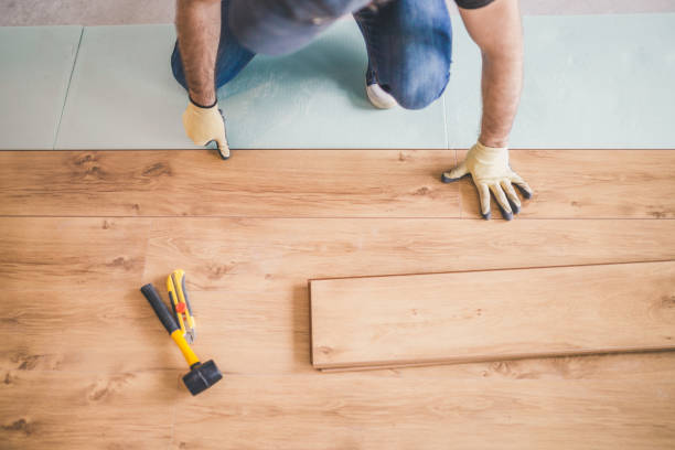 istock Laying a new laminate with a wooden pattern 1177388106