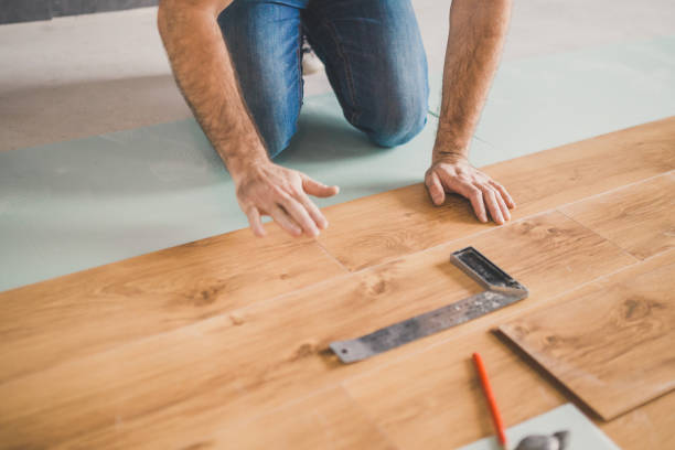 istock Finishing work at home - laying a laminate flooring 1177388445