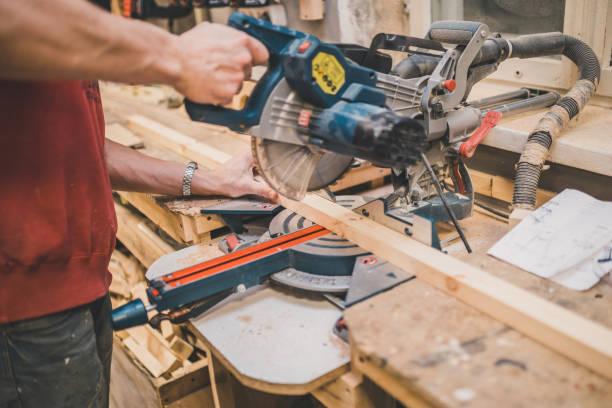 istock A craftsman cuts a wooden block on an electric circular 1177389347