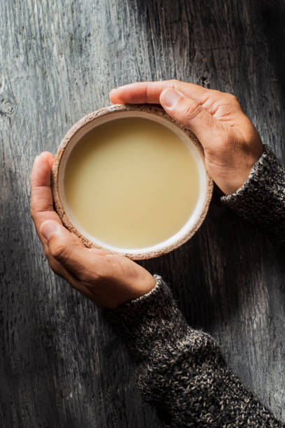 istock man warming up with a bowl of hot soup 1177389963