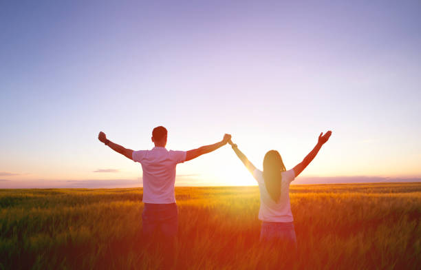 istock Couple feeling free in a beautiful natural setting. 1177390453