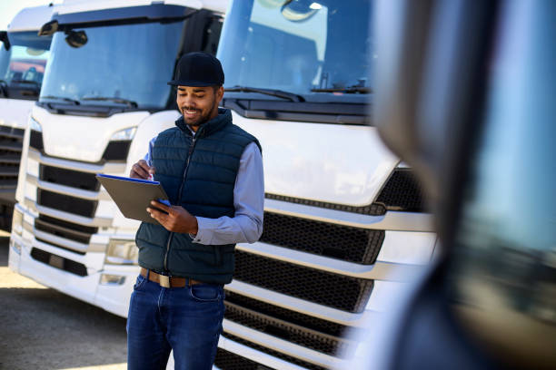 istock Truck driver checking the list 1177392369