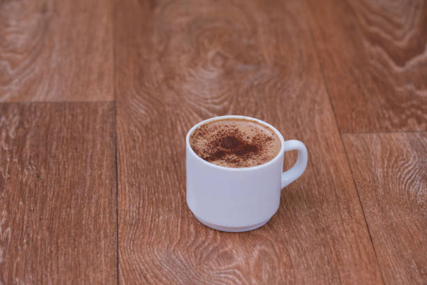istock Coffee cup top view on old wooden 1177394319