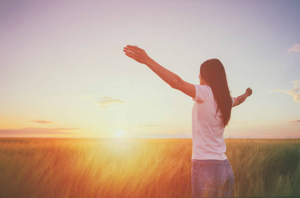 istock Woman  feeling free in a beautiful natural setting. 1177394637