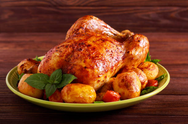 istock Roast whole chicken with vegetables 1177395842