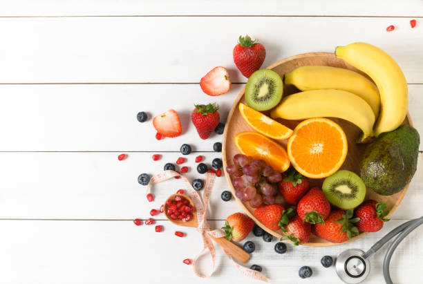 istock Mixed fresh fruit salad with strawberry with Stethoscope 1177397957