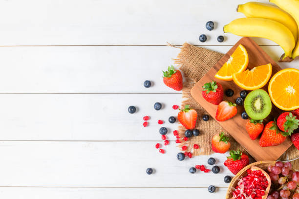 istock Mixed fresh fruit salad with strawberry, blueberry, orange 1177398649