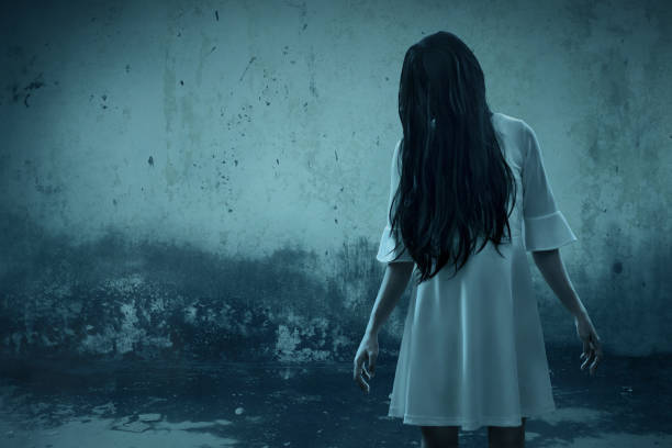 istock Scary ghost woman in haunted house 1177400211