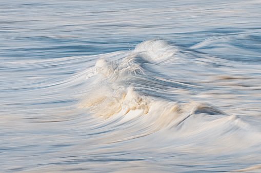 Photo of a sea foam with in camera panning technique