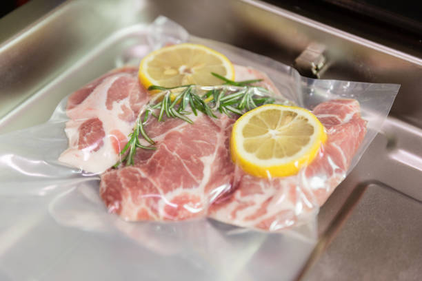 istock Sous vide steak with rosemary and lemons in vacuumed package. 1177401847