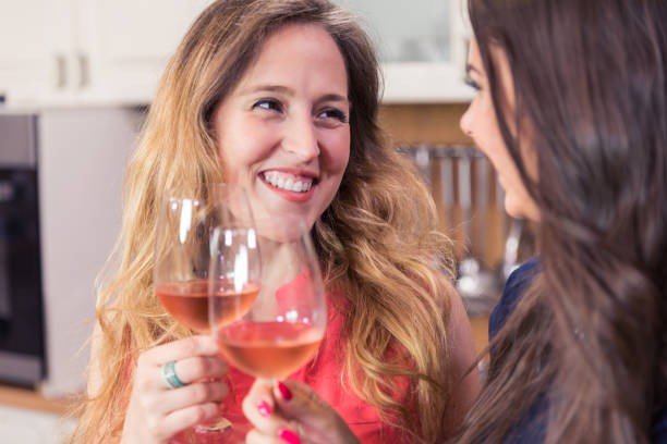 istock Happy female friends toasting with wine. 1177401927
